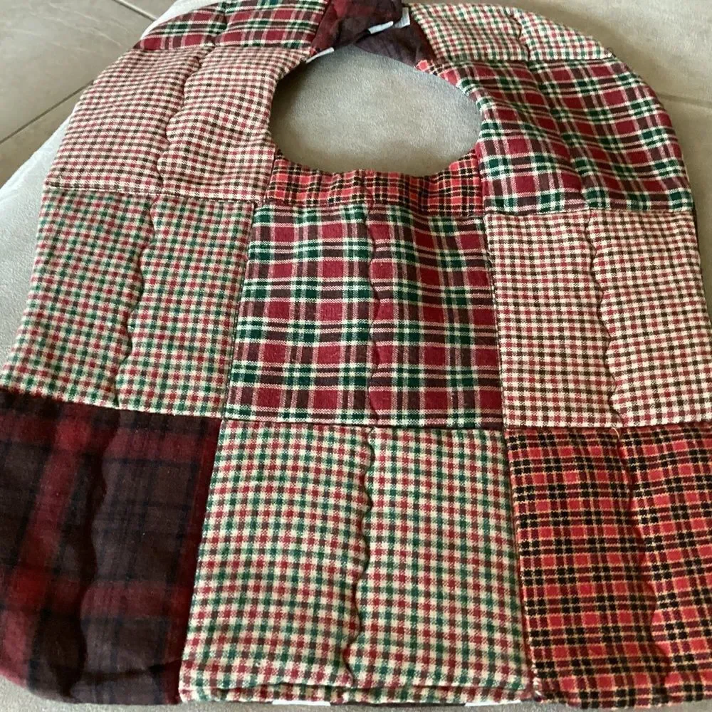 NWT. Hand, crafted baby bib in brown and green shirt plaids